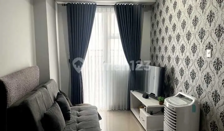 ruang keluarga unit 1 kamar furnished di