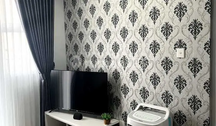 ruang keluarga unit 1 kamar furnished di