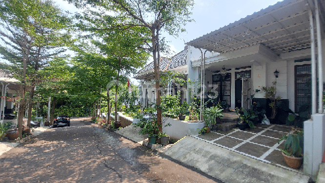 tampak depan rumah grand cimandala ciluar akses