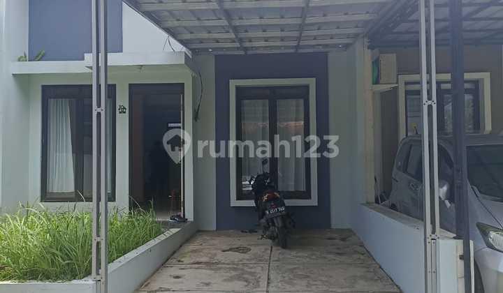 tampak depan dijual rumah di kebun raya