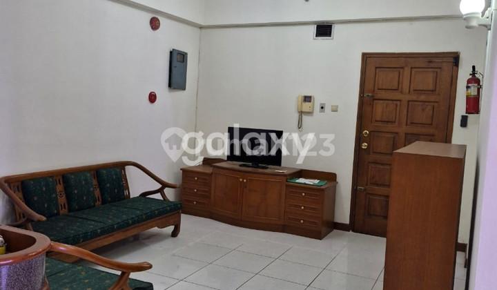 tampak depan kondominium apartemen juanda