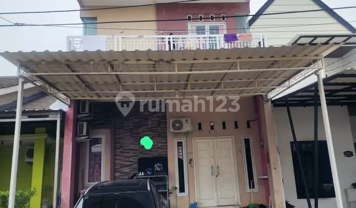 tampak depan di jual cepat rumah cluster