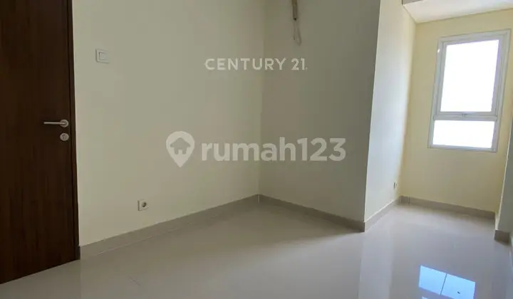 ruang tamu apartemen grand icon caman 2br
