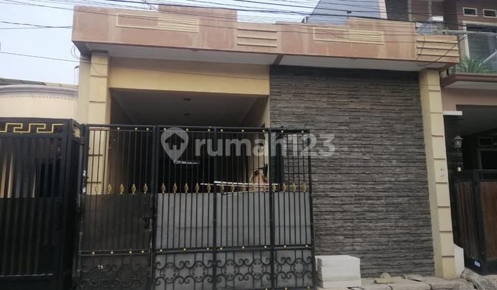 tampak depan rumah bagus dan siap pakai
