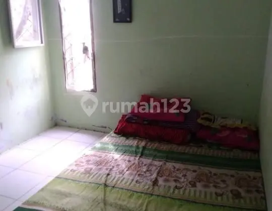 kamar tidur rumah di villa nusa indah