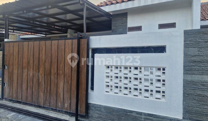 tampak depan perumahan terjangkau dekat stt telkom