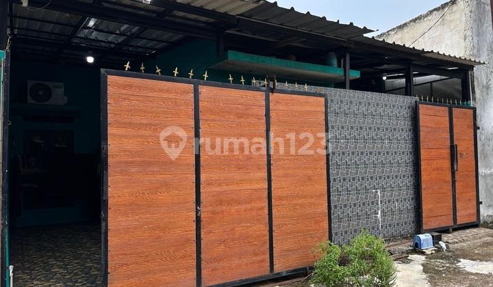 tampak depan rumah dijual komplek perumahan griya