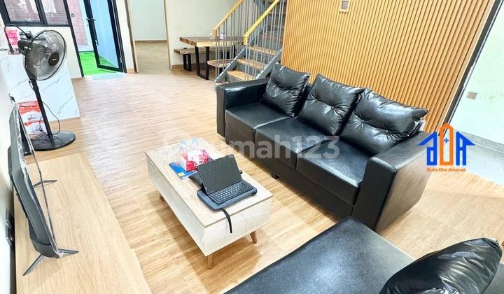 ruang tamu rumah furnished 4 kamar tidur