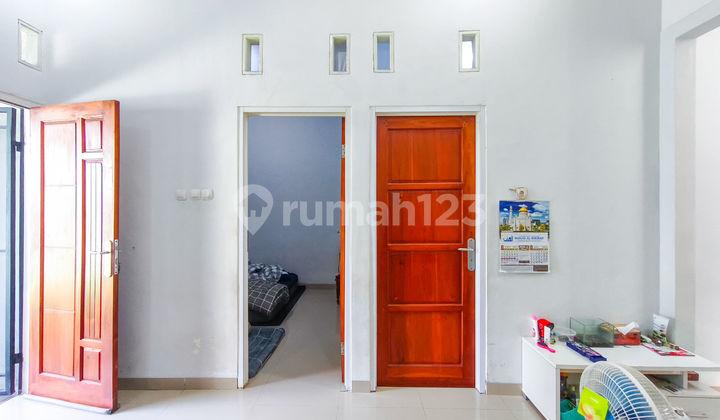 ruang tamu rumah hadap selatan 15 menit