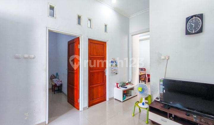ruang tamu rumah hadap selatan 15 menit