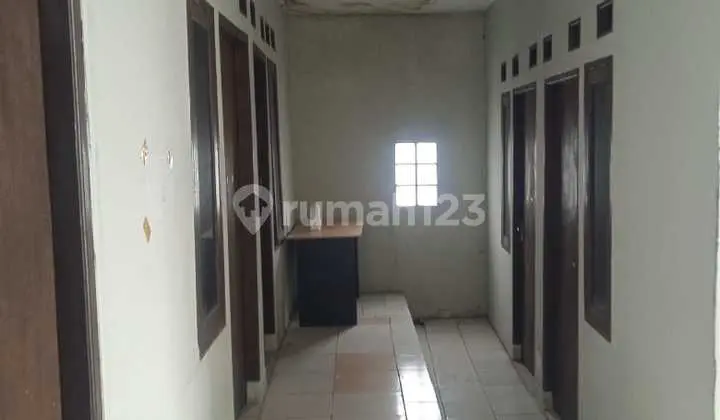 ruang tamu dijual gedung kost-kosan 27 kamar