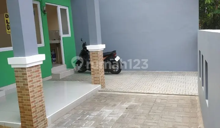 garasi/carport rumah sudah renovasi di limus