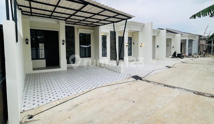 garasi/carport rumah siap huni dekat jalur