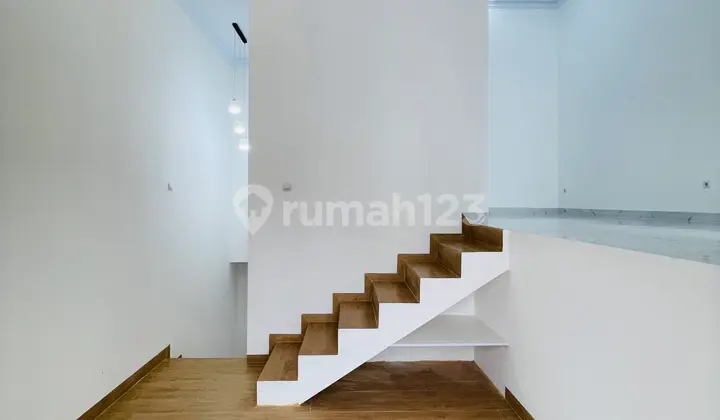 ruang tamu rumah pancoran mas tanah besar