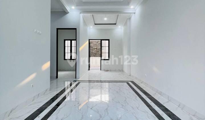 ruang tamu rumah siap huni tanah di