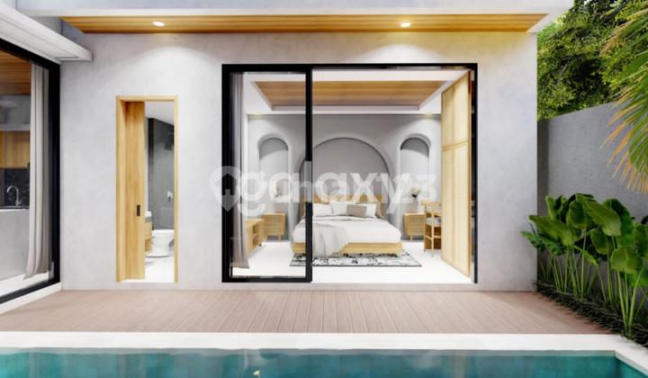 tampak depan villa mewah dalam komplek modern