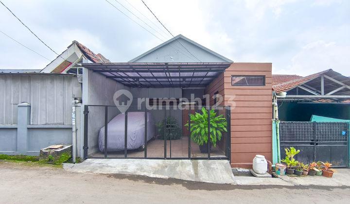tampak depan rumah terawat 8 menit ke