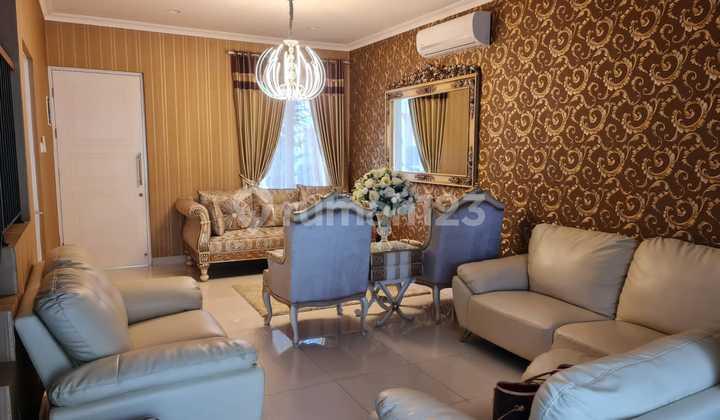 ruang tamu rumah minimalis full furnished di