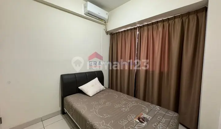kamar tidur unit apartemen disewakan di malang