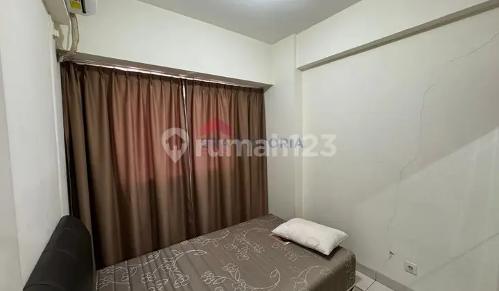 kamar tidur unit apartemen disewakan di malang
