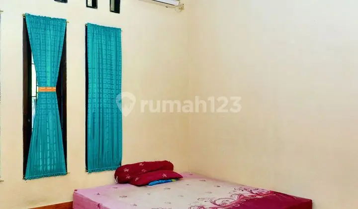 ruang tamu rumah luas hadap timur 10