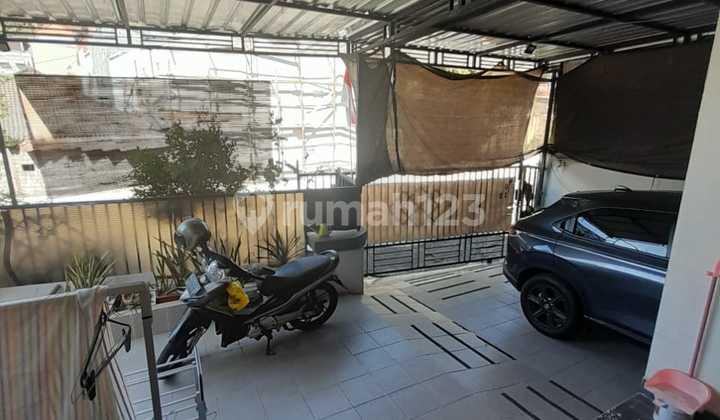 garasi/carport rumah modern minimalis 2 lantai