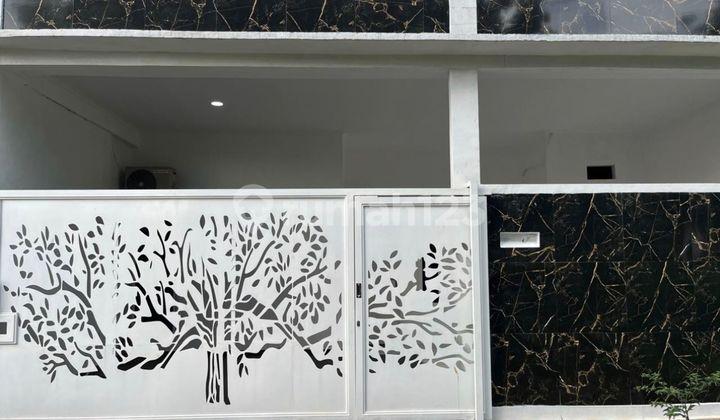 tampak depan rumah lt 113 minimalis akses