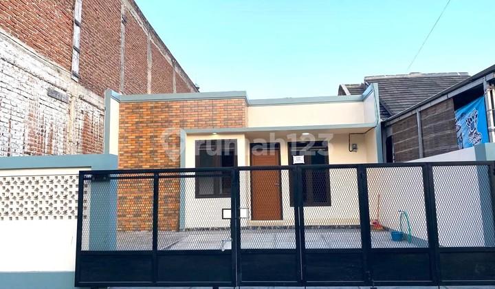 tampak depan rumah tumbuh full dak siap