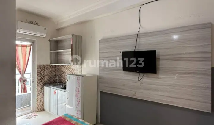 tampak depan apartemen gunawangsa merr rugi hot