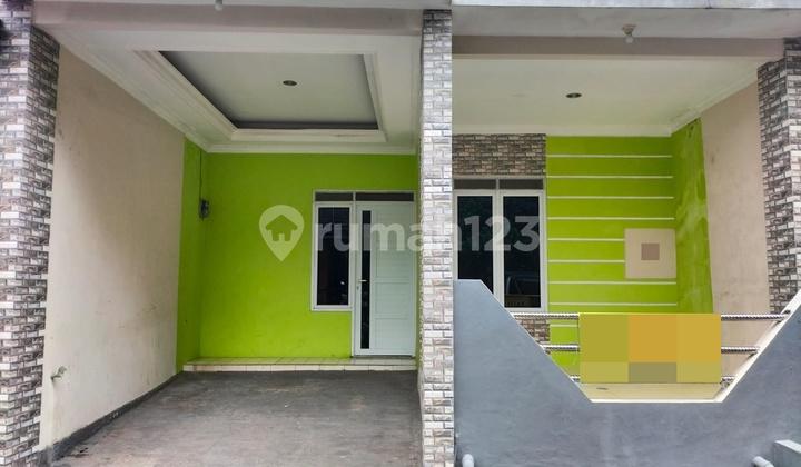 tampak depan rumah minimalis siap huni di