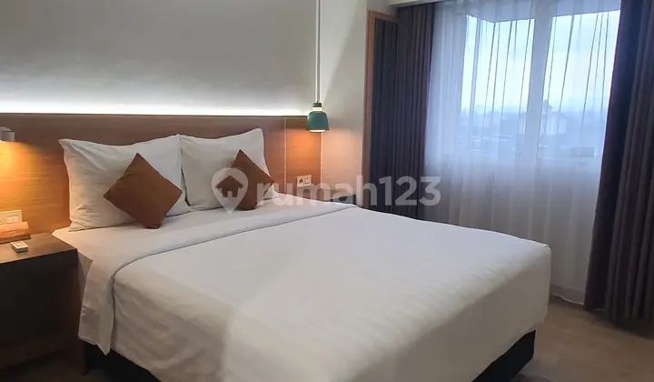 kamar tidur condotel pusat kota grand dafam