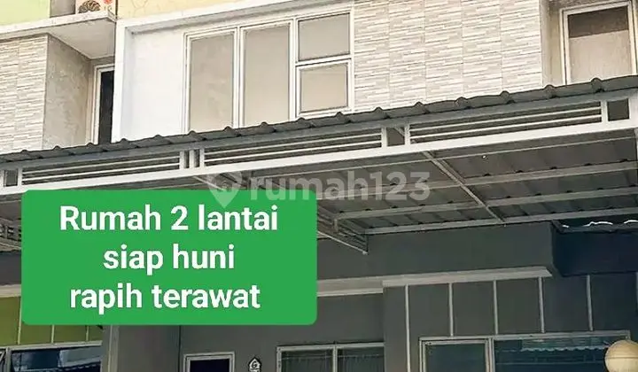 tampak depan rumah 2,5 lantai shm bagus