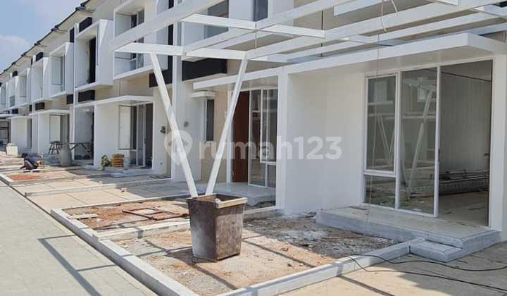 tampak depan rumah cluster marocco grand kota