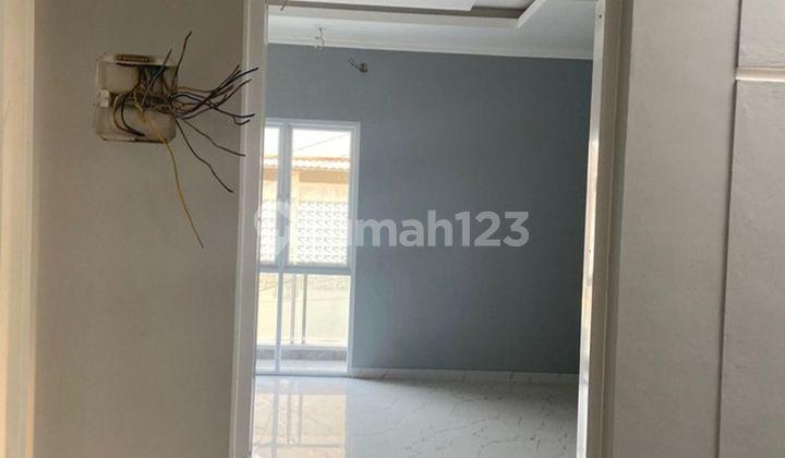 ruang tamu rumah 2 carport 15 menit