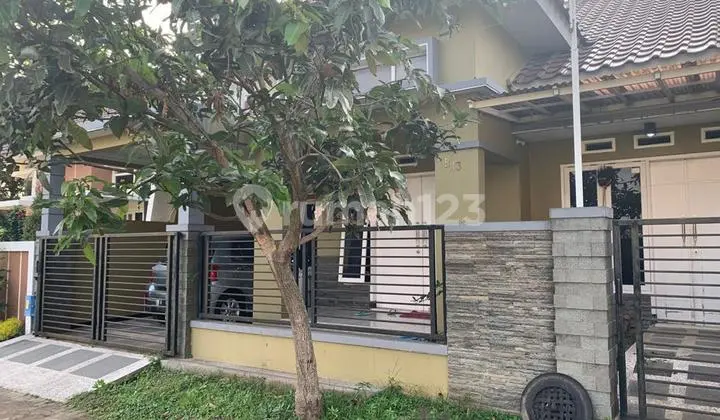 tampak depan rumah asri siap huni puri
