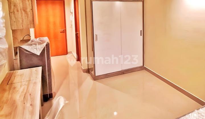 kamar tidur apartment studio fully furnished di