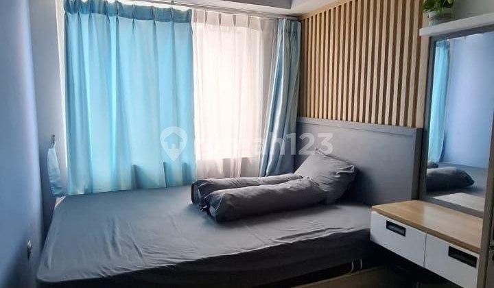 kamar tidur apartemen solo kota siap huni