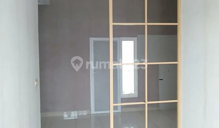 ruang tamu jual rumah full furnished hadap