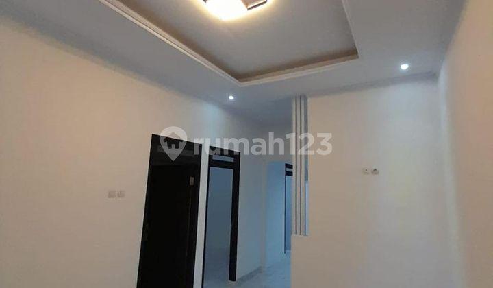 ruang tamu rumah strategis shm dibantu kpr