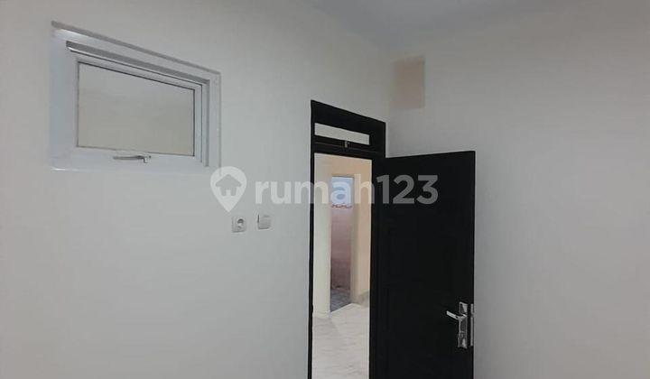 ruang tamu rumah strategis shm dibantu kpr