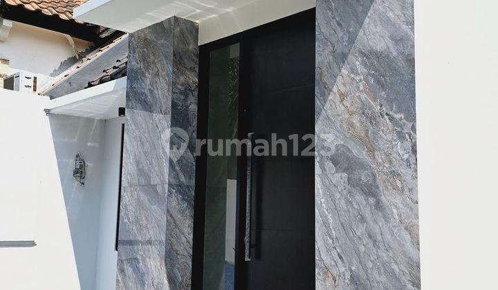 tampak depan rumah taman puspa raya citraland
