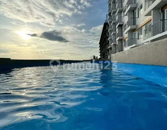 kolam renang apartemen tipe studio siap huni