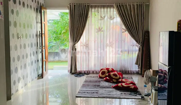 ruang tamu rumah baru renovasi view gunung