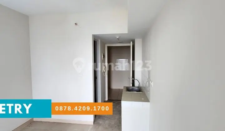 ruang tamu apartemen studio unfurnished the springlake