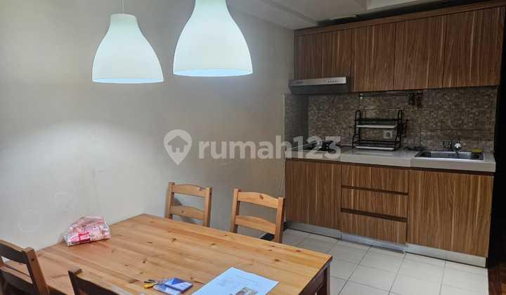 ruang makan disewakan the wave apartment 2br