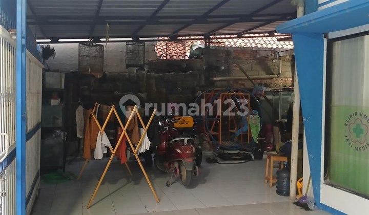ruang jemur rumah 1.5 lantai plus klinik