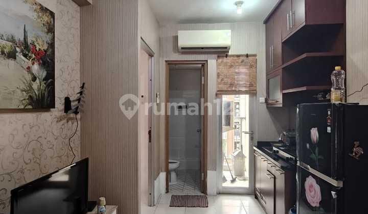 tampak depan apartemen gunawangsa manyar 2br furnished