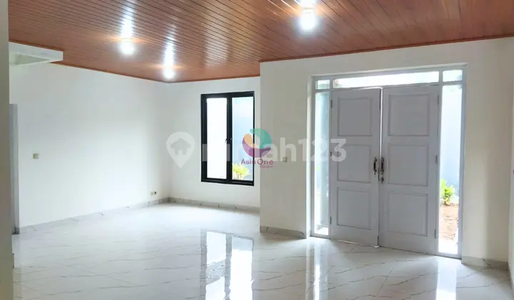 ruang tamu rumah cantik modern terenovasi di