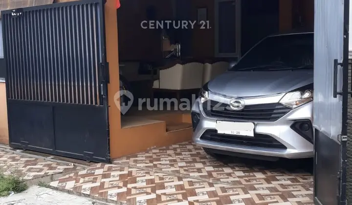 tampak depan rumah siap huni di bumi