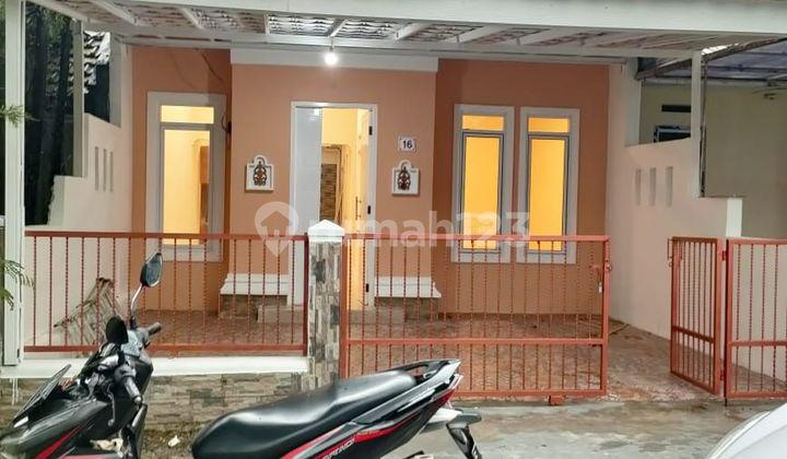 tampak depan rumah rapih dan cantik siap